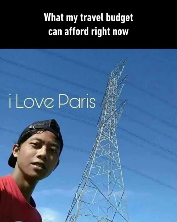 Young man in a red shirt and cap taking a selfie in front of a tall metal electricity transmission tower against a blue sky, with the text "i Love Paris" added